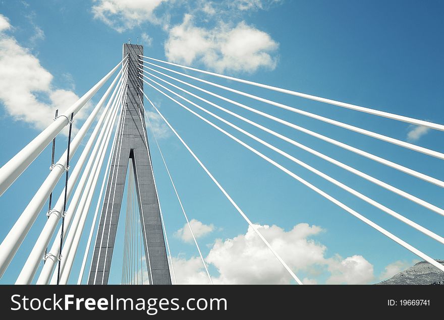 Fragment of a cable stayed bridge on the sky background. Fragment of a cable stayed bridge on the sky background
