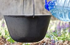 In A Pot Pour The Water For Cooking. Stock Photos In A Pot Pour The Water For Cooking. Stock Photos