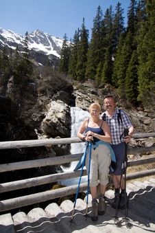 Retired Couple Hiking In The Alps Stock Image
