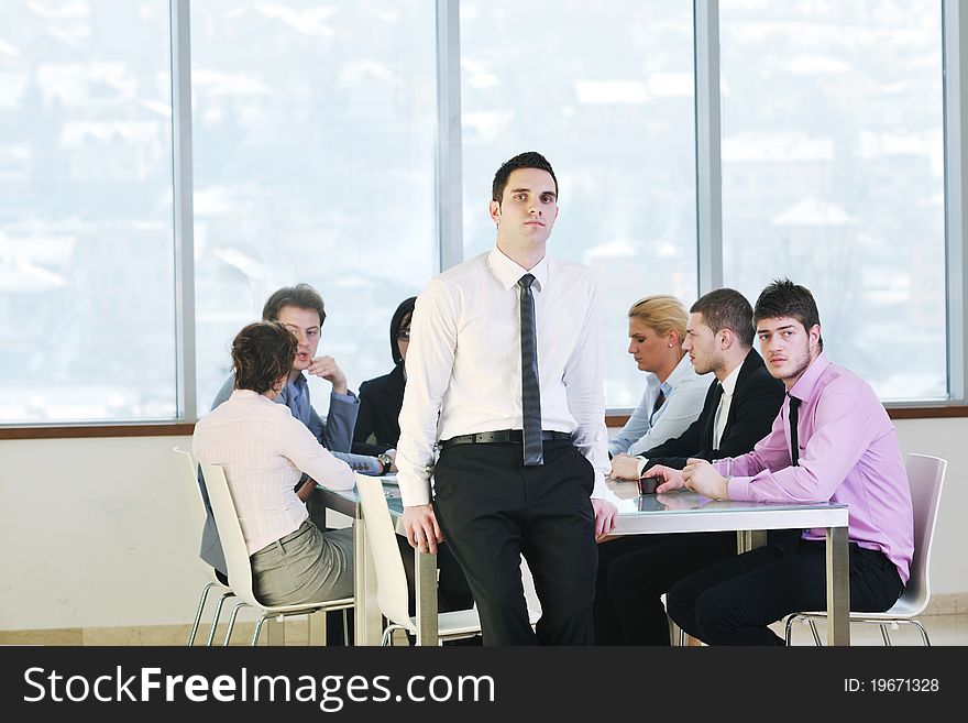 Group Of Business People At Meeting