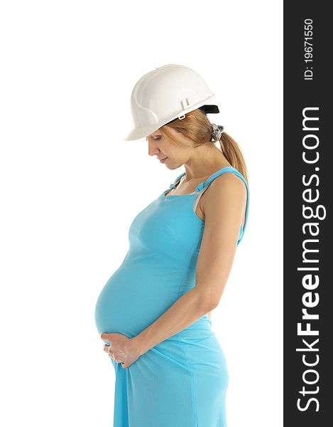 Pregnant woman in helmet isolated on white