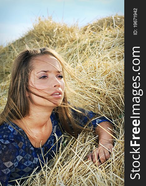 Girl in the hay, straw