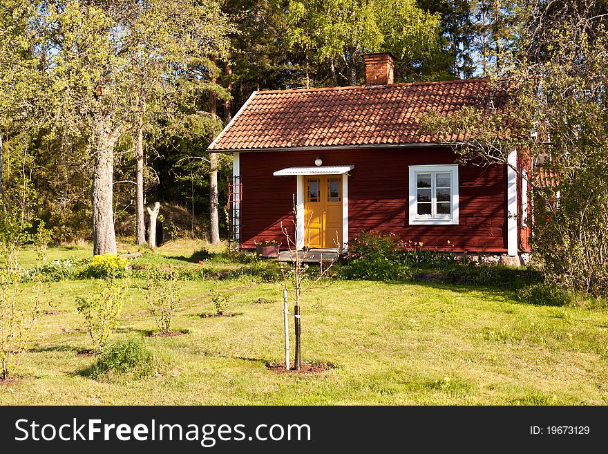 Idyllic Swedish house. typical old wooden, painted red and white. Idyllic Swedish house. typical old wooden, painted red and white.
