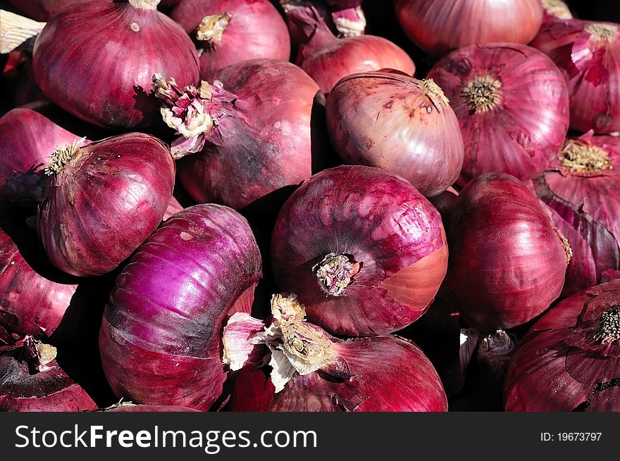 Big raw purple onions used commonly in Asian and Western cuisine. Big raw purple onions used commonly in Asian and Western cuisine.