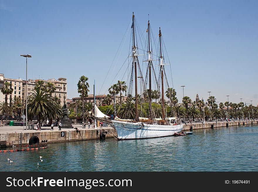 Spain, Catalonia, Barcelona, Port Vell summer stroll along the waterfront. Spain, Catalonia, Barcelona, Port Vell summer stroll along the waterfront