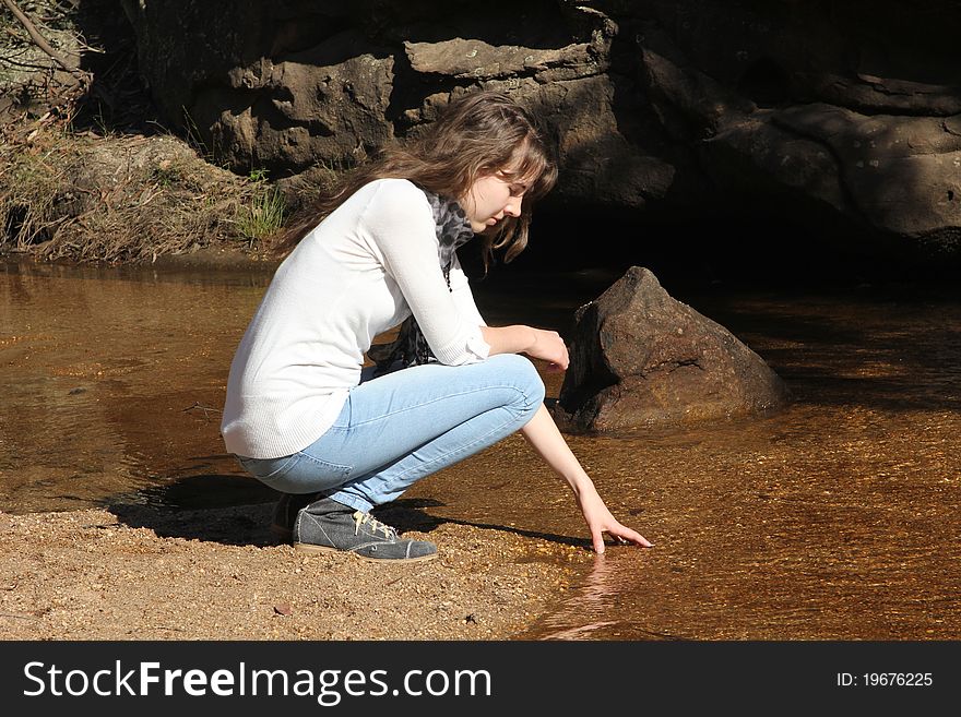 Teen Girl At Riverbed