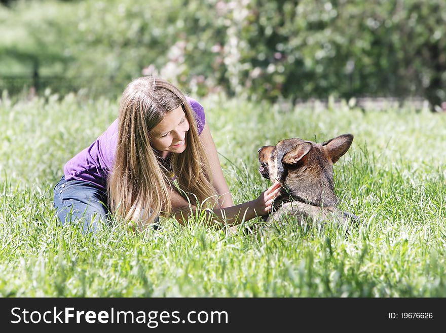 Girl with dog outdoors
