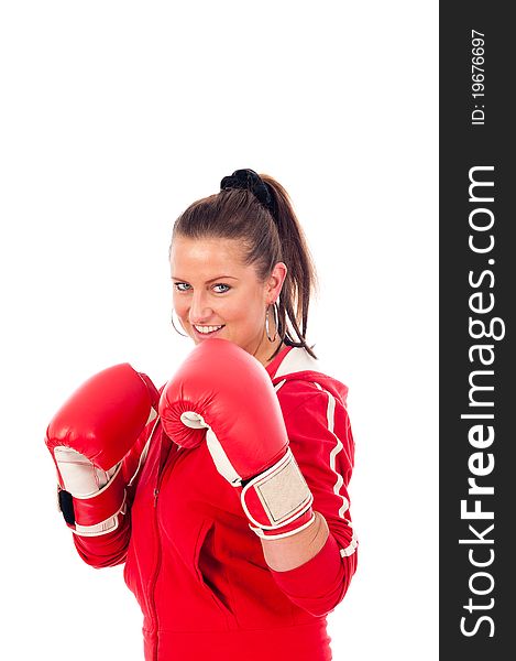 Young woman boxing by on withe