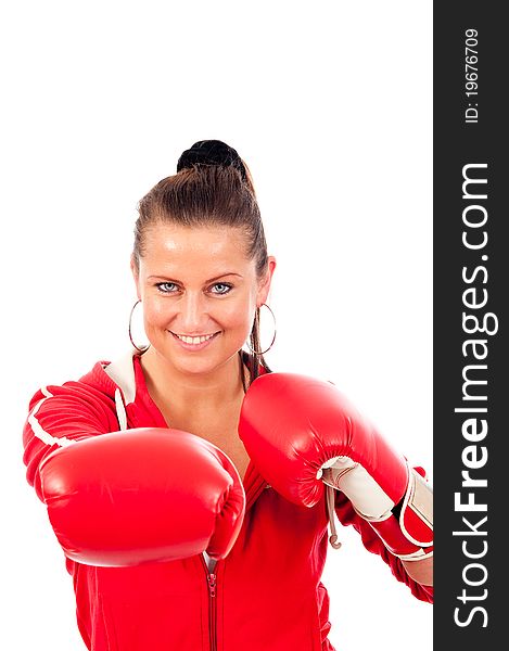 Young woman boxing by on withe