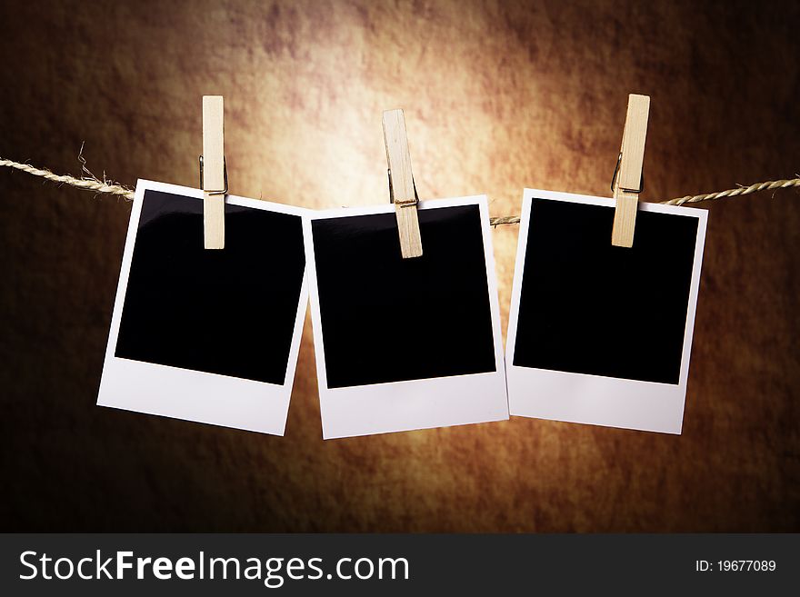 Three Instant Photos on a old stone background. Three Instant Photos on a old stone background