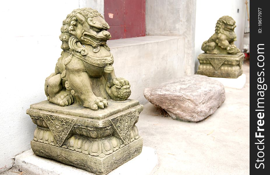 Stone Lion sculpture, symbol of protection & power