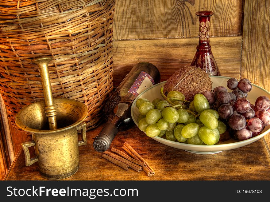 Wine And Grapes On Wooden Background
