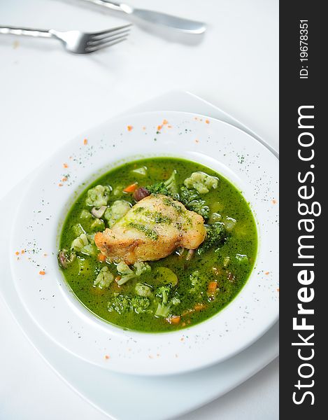 Fish and vegetable green soup