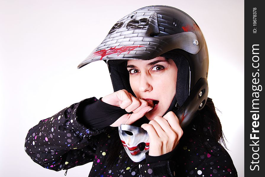 The girl the in a helmet of the motorcyclist. The girl the in a helmet of the motorcyclist.