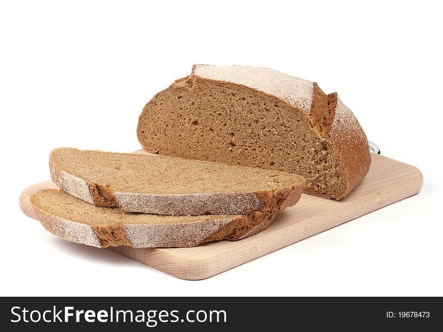 Sliced rye bread on the board isolated on white