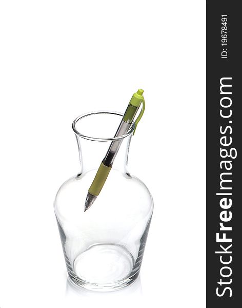 Fragile glass transparent vessel with green pen