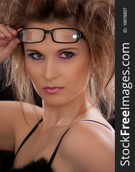 Young women with sexy look holding glasses. Young women with sexy look holding glasses