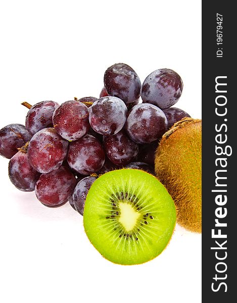 The fruits include kiwi ,mango and grape in white background