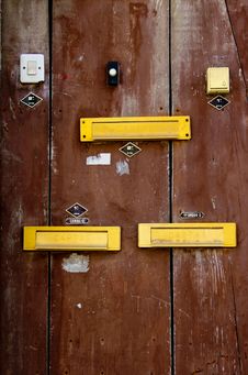 A Door With Doorbells And Mailslots In Lisbon Stock Photography A Door With Doorbells And Mailslots In Lisbon Stock Photography