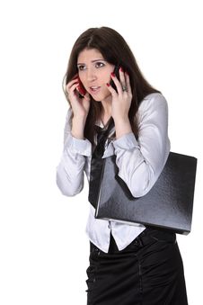 Angry Businesswoman Speak Two Phones Royalty Free Stock Photography Angry Businesswoman Speak Two Phones Royalty Free Stock Photography