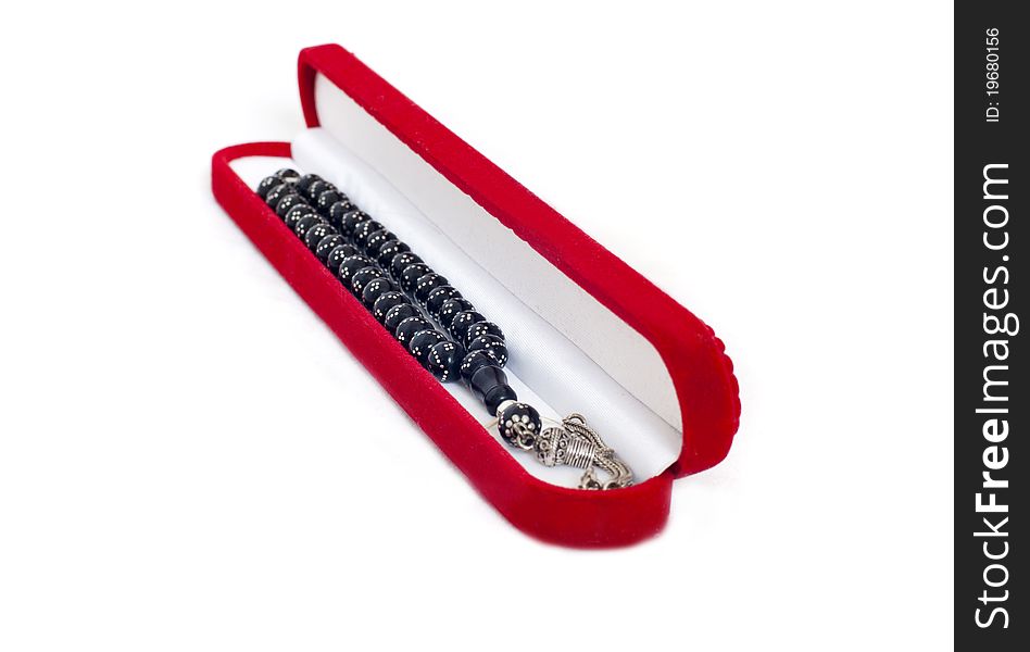 Traditional muslim black beads in red case. Traditional muslim black beads in red case