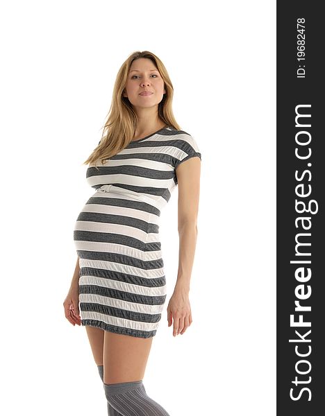 Happy pregnant woman in striped dress