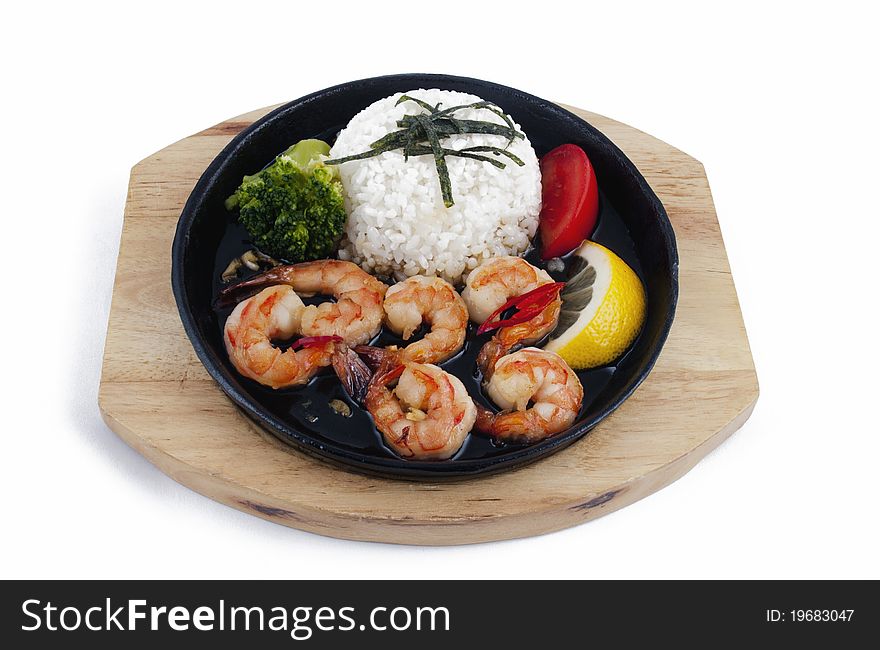 Photo of shrimps with vegetables on a plate