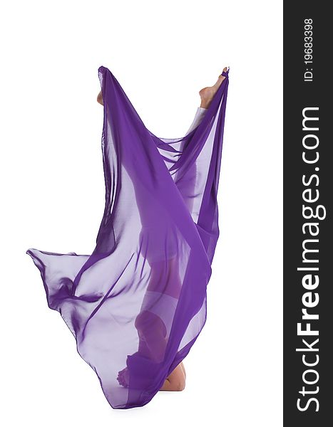 Woman With Flying Purple Cloth Walking In The Air