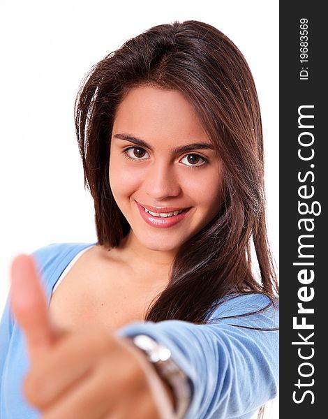 Woman showing ok over white background. teen