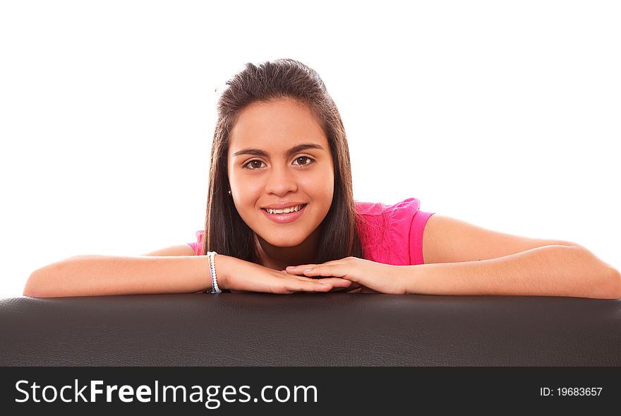 Young woman looking at the camera over white background