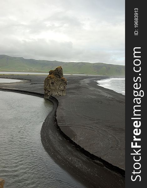 Black, volcanic beach at Dyrholaey, southern Iceland. Black, volcanic beach at Dyrholaey, southern Iceland