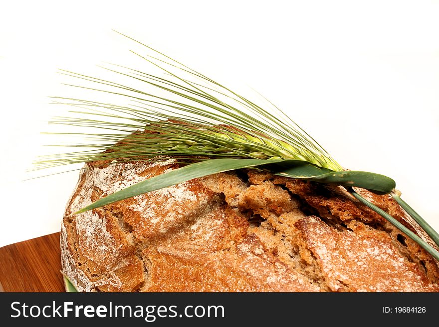 Crusty bread with green barley