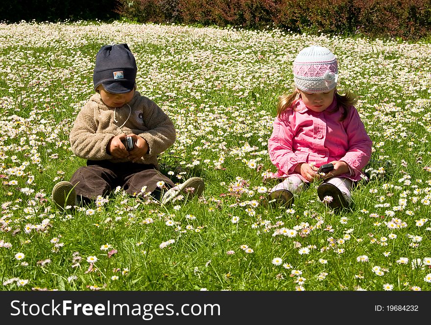 Boy And Girl Playing In The Park