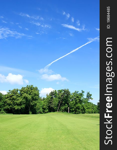 Golf course with blue sky