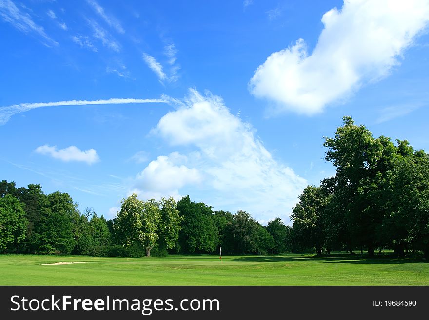 Golf course with blue sky