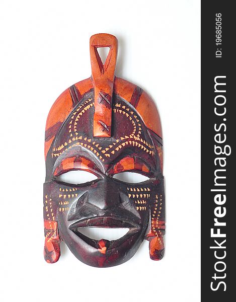 Wooden crafted voodoo mask in carnival