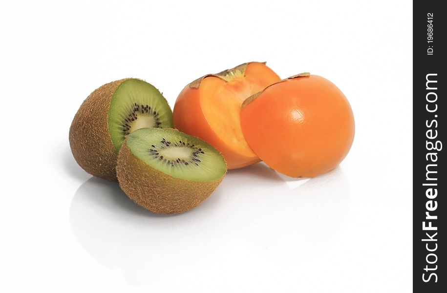 Kiwi and other fruit on isolated white background