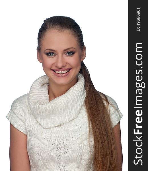 Portrait of a young woman in a light sweater on the isolated background