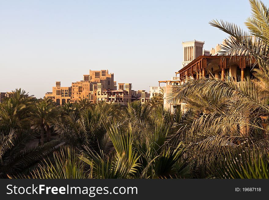Madinat Jumeirah Resort in Dubai, surrounded with palm trees. Madinat Jumeirah Resort in Dubai, surrounded with palm trees