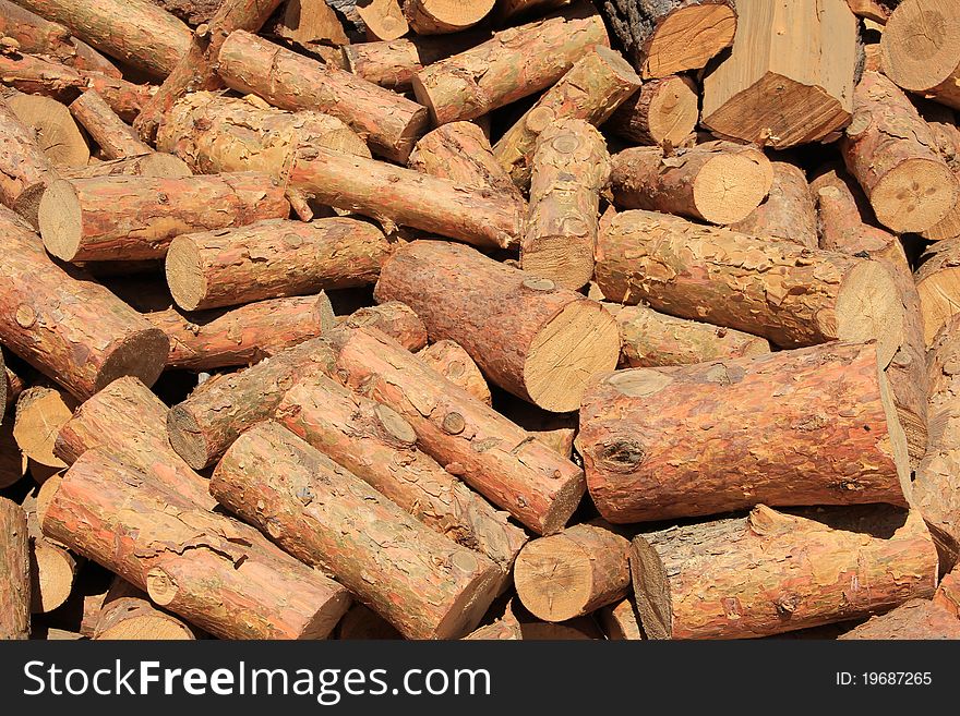 Heap of wooden chocks are used to heat homes. Heap of wooden chocks are used to heat homes.