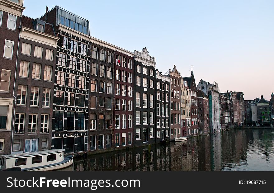 Amsterdam canals and typical houses .