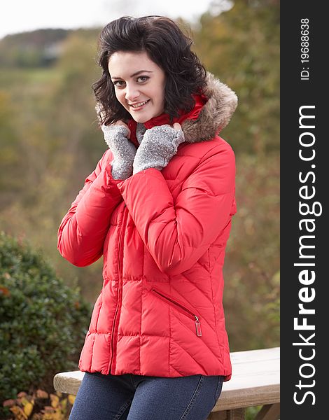 Portrait of young woman smiling at camera