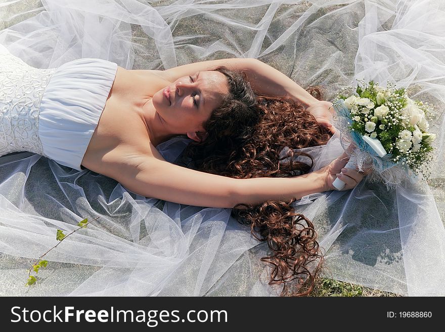 Bouquet in the hands of the bride