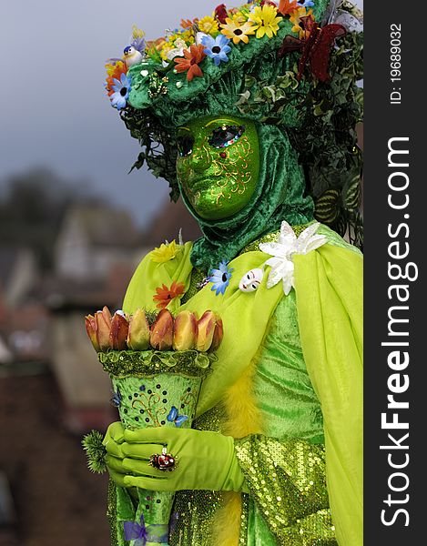 A portrait of one of the most beautiful masks photographed in open street during venetian carnival. A portrait of one of the most beautiful masks photographed in open street during venetian carnival.