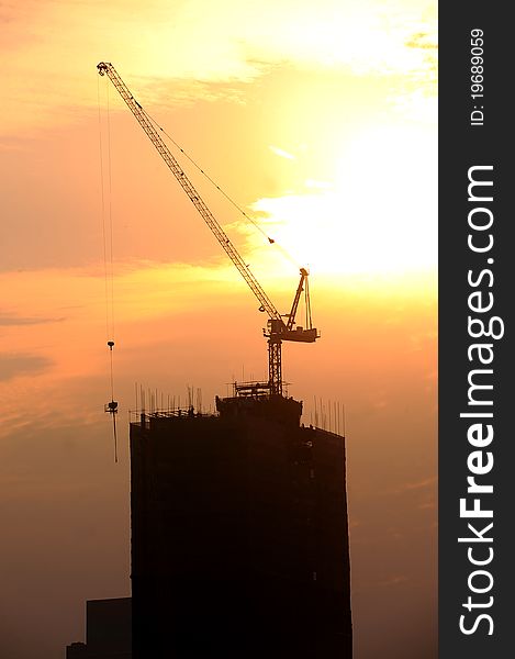 Building tower and yellow sky