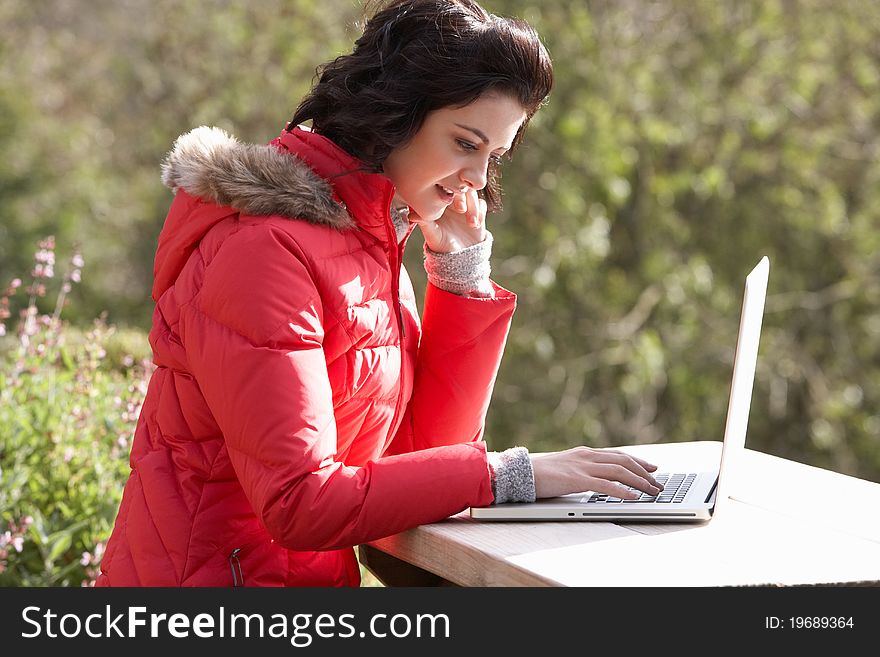 Young Woman With Laptop Computer