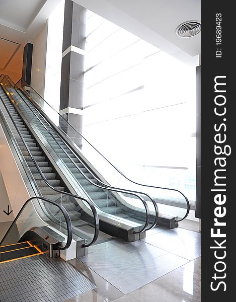 Modern steps of moving business escalator