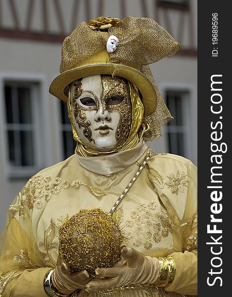 A portrait of one of the most beautiful masks photographed in open street during venetian carnival. A portrait of one of the most beautiful masks photographed in open street during venetian carnival.