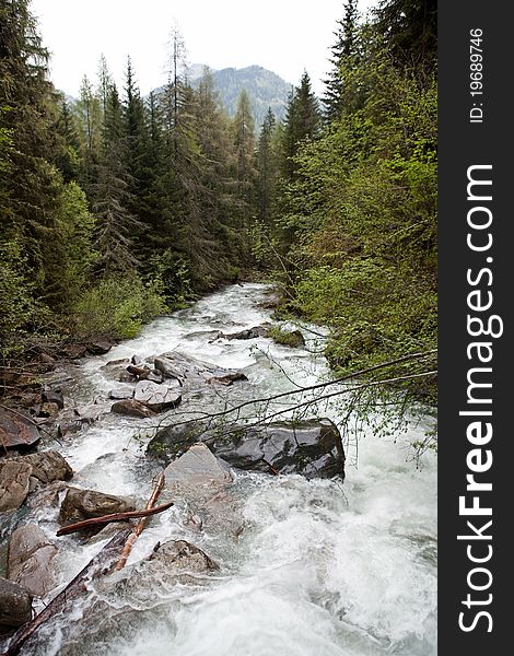 River from the melting glacier, austrian alps. River from the melting glacier, austrian alps