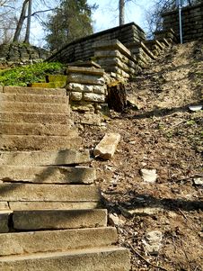 Old Ruined Stairway Running Down From The Hill Stock Photo